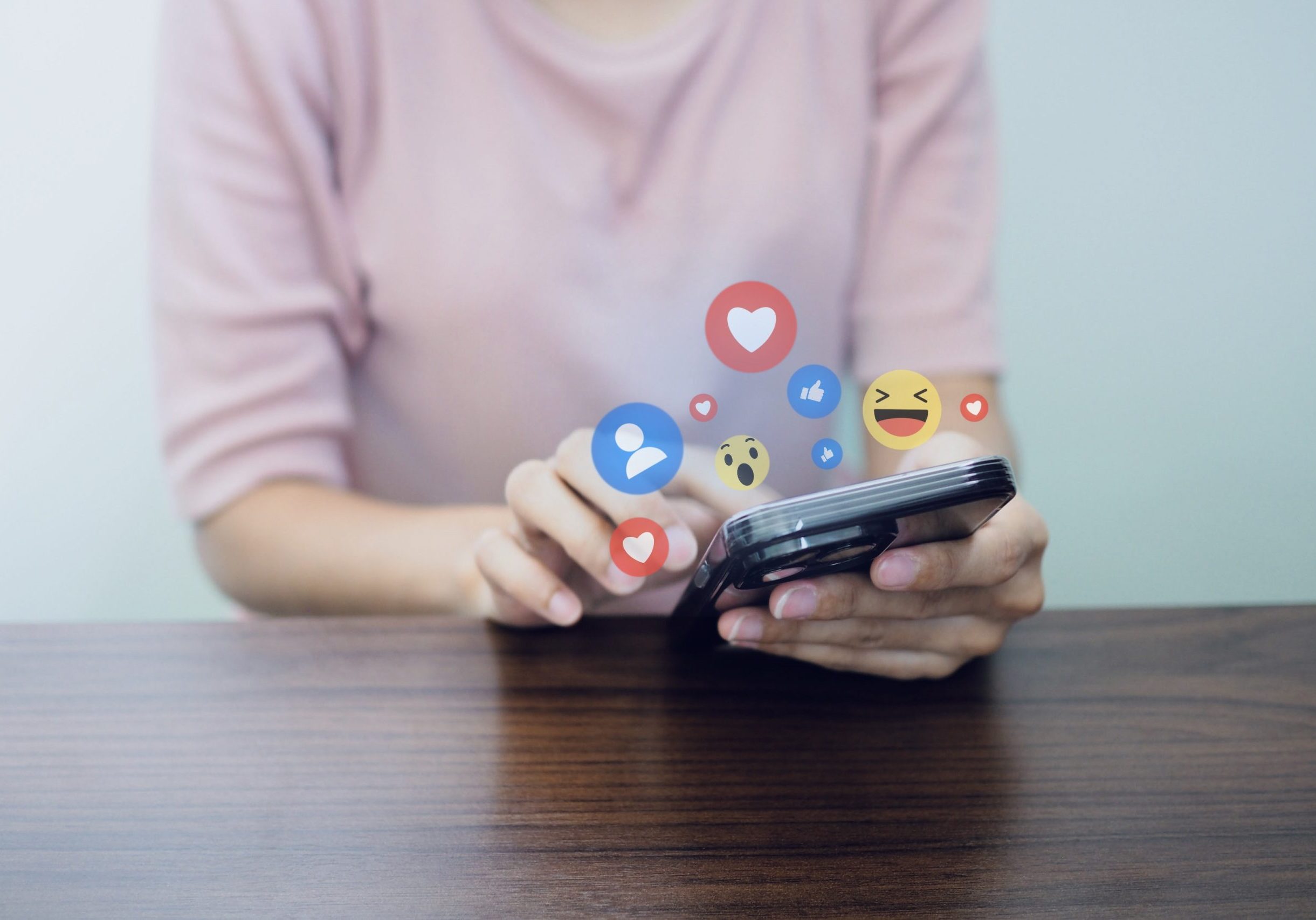 social-media-and-online-digital-concept-people-use-smart-phone-with-social-media-and-work-from-home-concept-free-photo